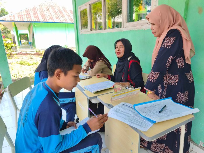 Tena Seventri, S. Pd. Dampingi Siswa MTsN 7 Kerinci dalam Persiapan OMI 2026 Tena Seventri, S. Pd. Dampingi Siswa MTsN 7 Kerinci dalam Persiapan OMI 2026